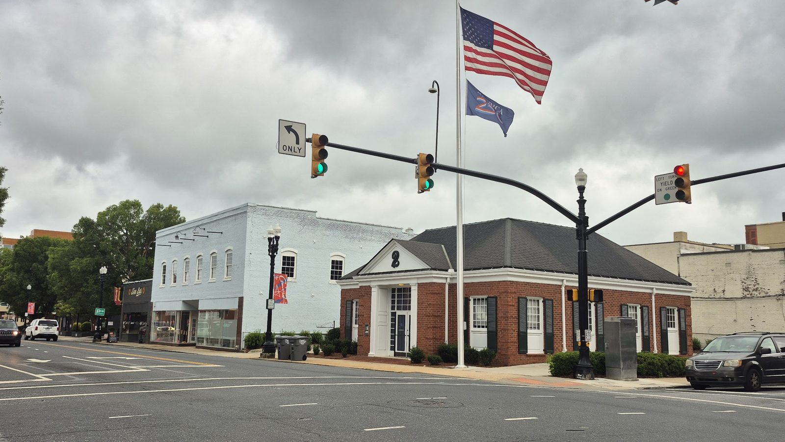 Church St S corner with TruForge Homes, Habitat for Humanity, Dive Bar and Benny DaCorsa's, Concord NC