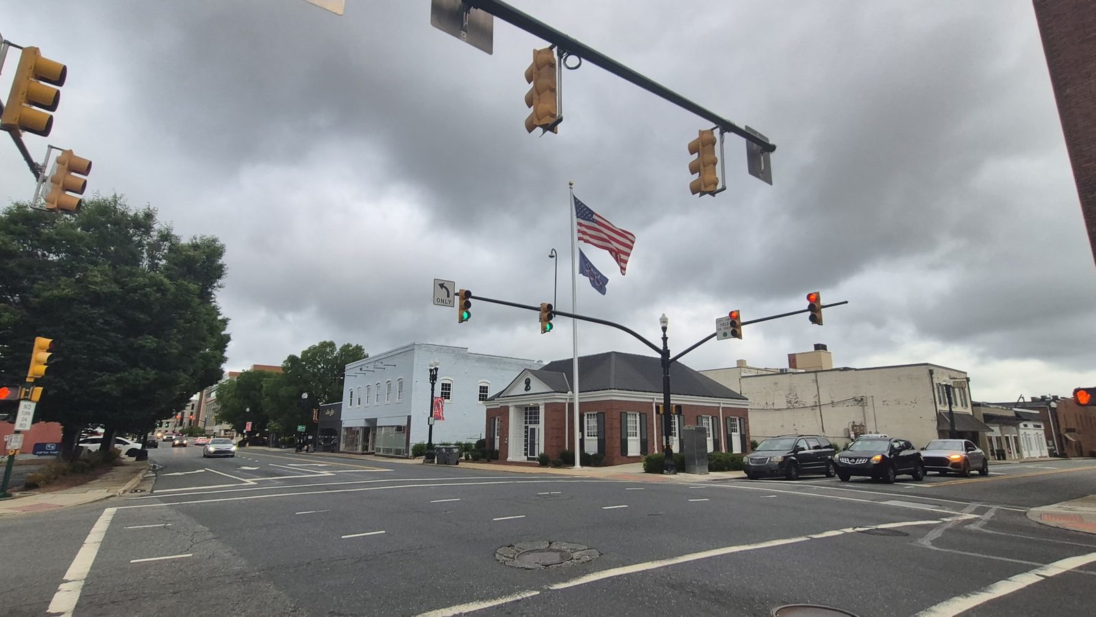 TruForge Homes and Lofts at the corner of Church St S and Cabarrus Ave E, looking toward the Cabarrus County Courthouse, Concord NC